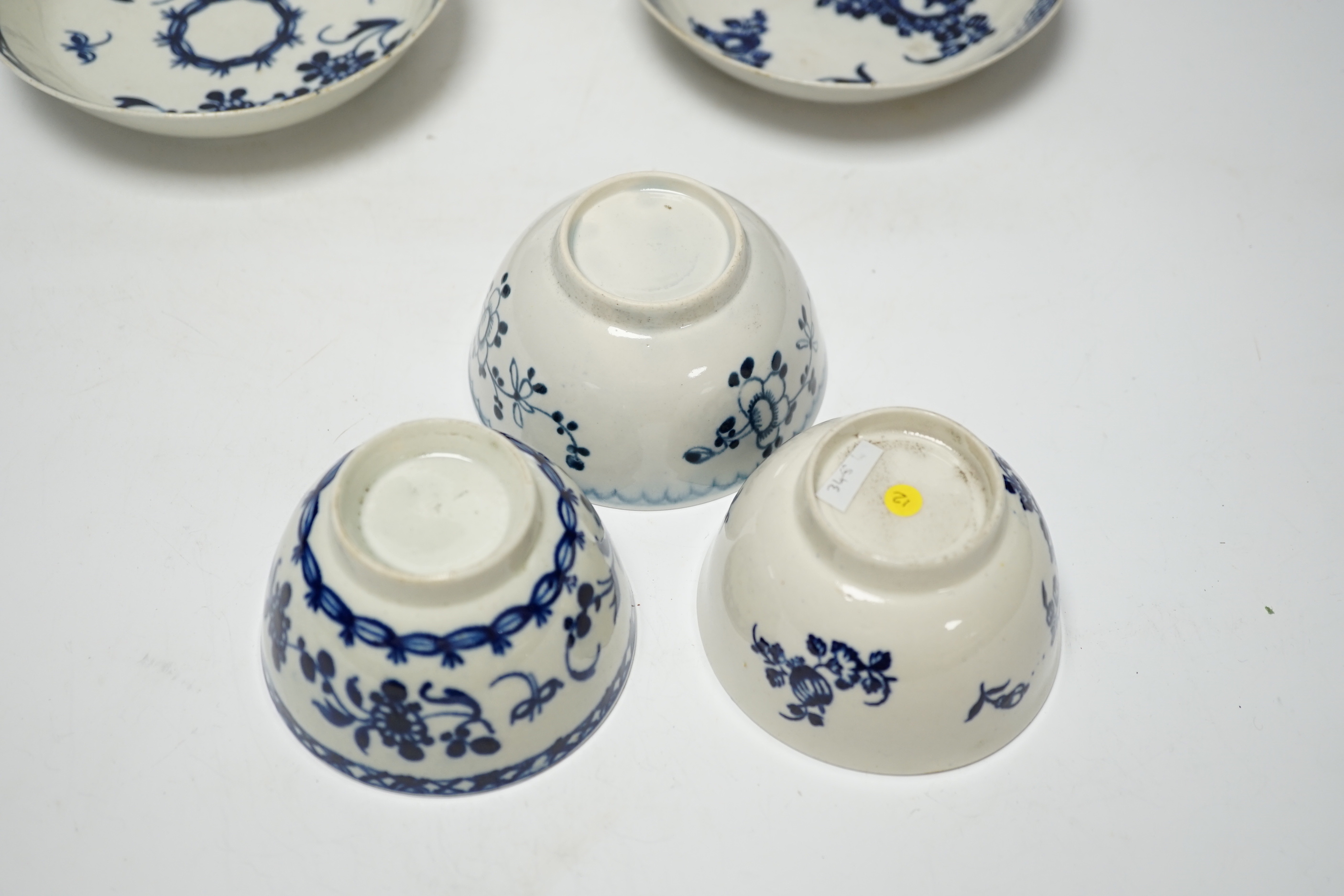 Three late 18th century Liverpool blue and white teabowls and saucers